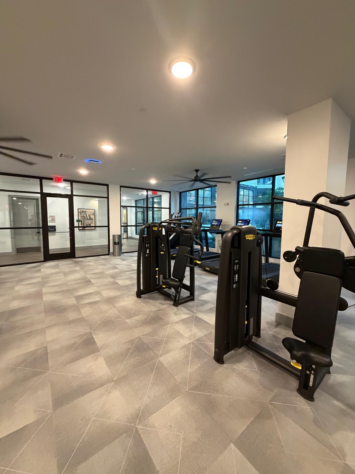 Technogym strength and cardio equipment in the fitness center at The Anderson