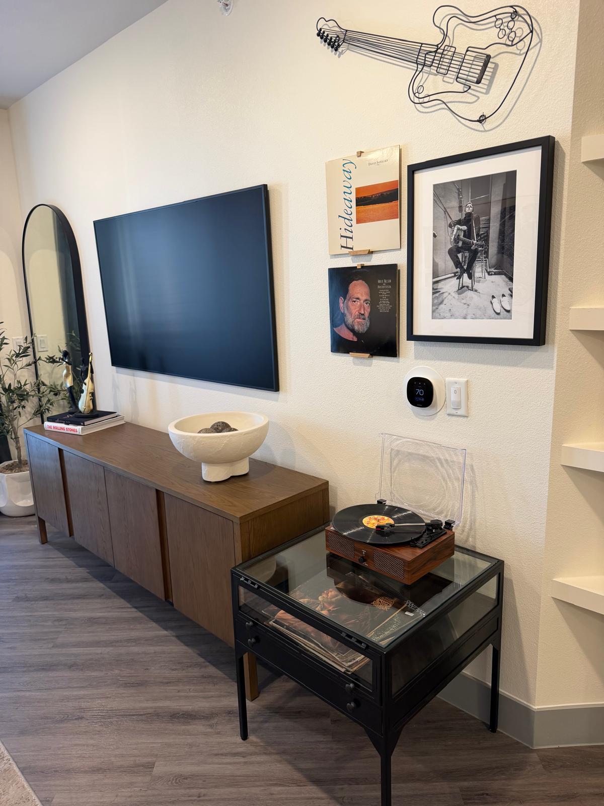 Close-up of the ecobee smart thermostat on the wall showing 70 degrees